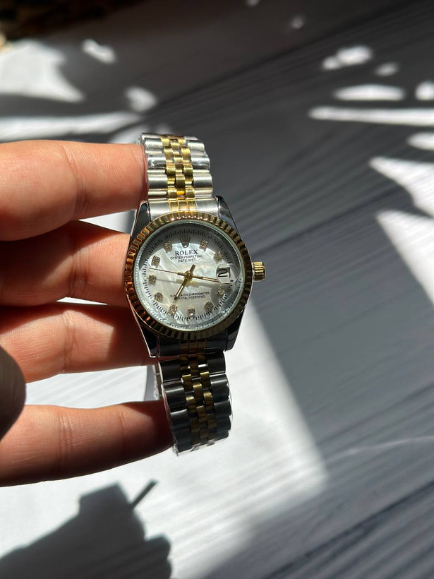 ساعت رولکس تاجدار مدل DATEJUST با شیشه ذرهبینی، ضدآب و رنگ ثابت